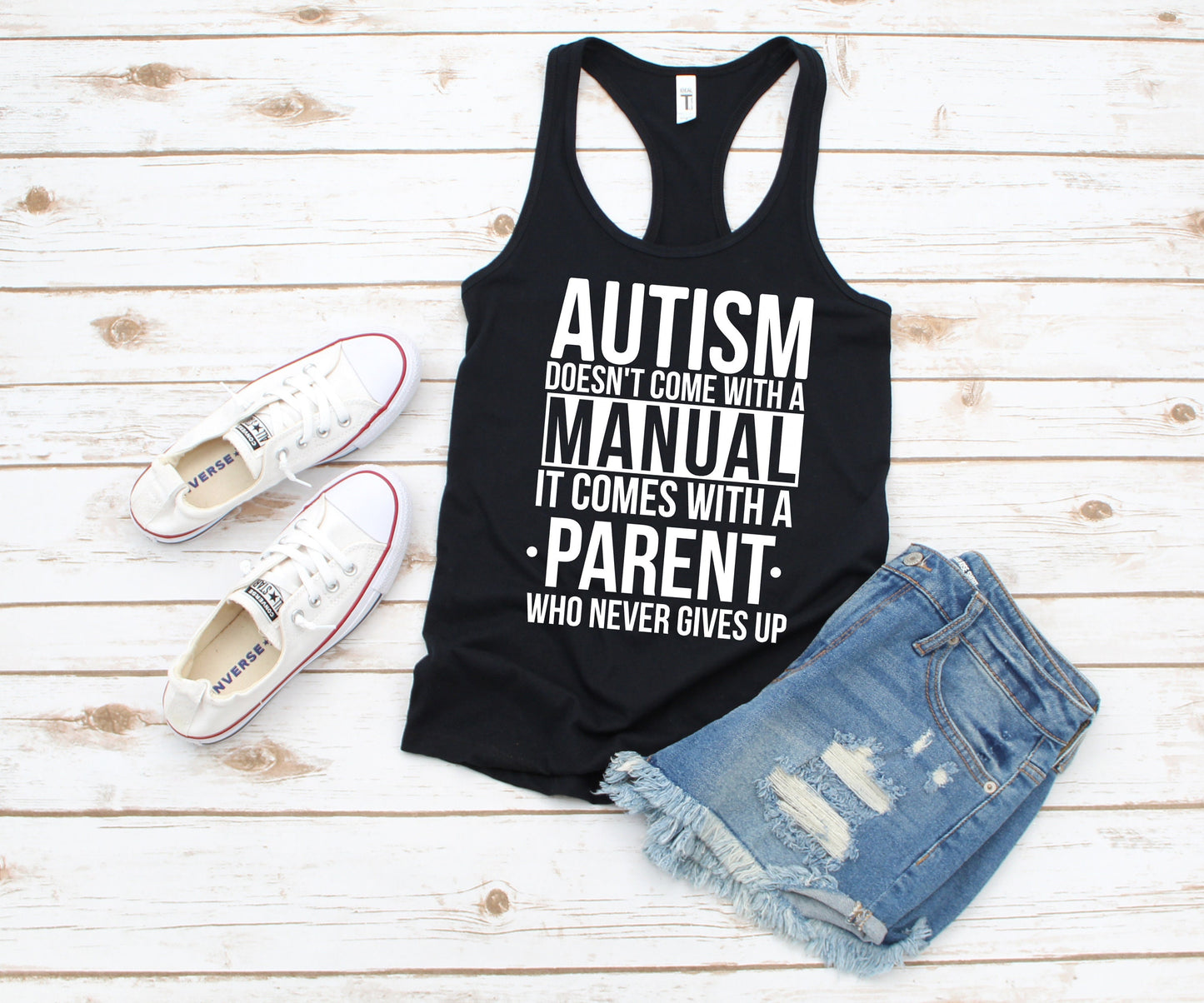 autism doesn't come with a manual, it comes with a parent who never gives up racerback tank top - autism mom - autism awareness